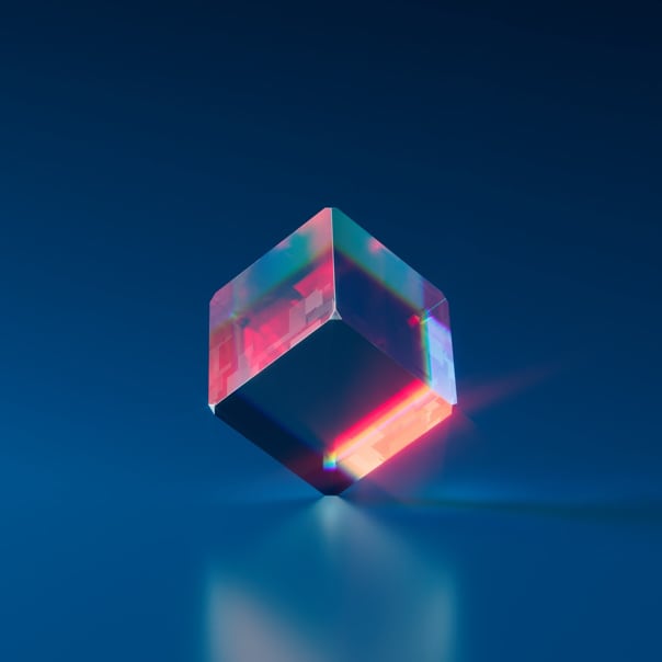 Image of a glass cube with red light reflect on a blue background representing the NTF Equilibrium #3429.